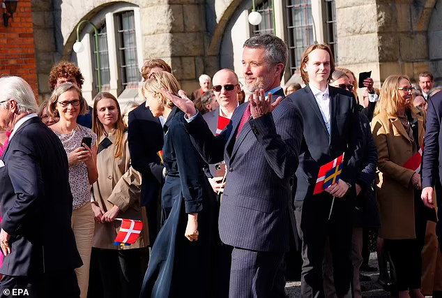 King Frederik repeatedly pokes fun at himself in a speech after awkward and 'tense' tour with wife Queen Mary - but experts claim it's a ploy