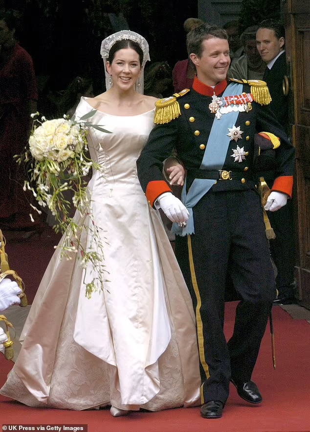 Body language expert reveals the one thing keeping Queen Mary and King Frederik together - as the Danish royals choose to WORK through their 20th wedding anniversary