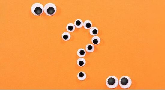 orange image with a white question mark on it made out of googly eyes for digital body language